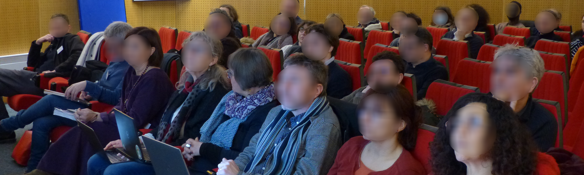 crowd listening to a scientific conference